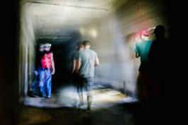 The group of urban explorers moves through the culvert shortly after entering the covered portion of the Gayoso Bayou. (Brandon Dahlberg)