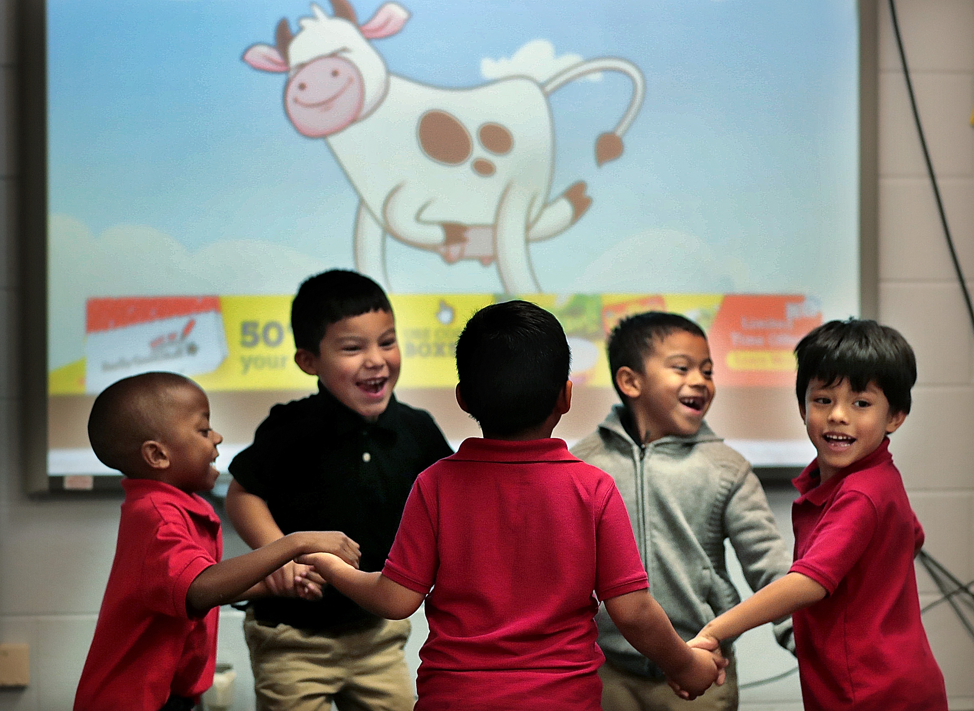 Yvonne Thomas' kindergarteners dance to a song about cows in one of Treadwell Elementary School's dual language classes on September 21, 2018. (Jim Weber/Daily Memphian)