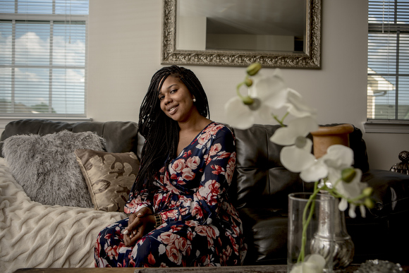 Ashley Gladney, owner of Mobile Mommy, stands for a portrait in her South Memphis home.