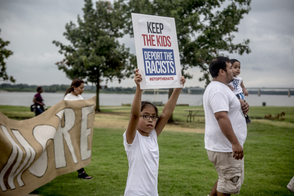 Over 100 people gathered at Martyr Park and marched down Riverside Drive to Beale Street in order to create visibility around the impact the Immigration and Customs Enforcement raids have had on the Latin American immigrant population in Memphis.