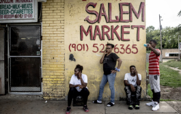 Folks hang out outside of Salem’s Market on Mississippi Avenue. The store has been open for decades in the neighborhood and has seen a significant slowing of business since Foote Homes closed and demolition started.