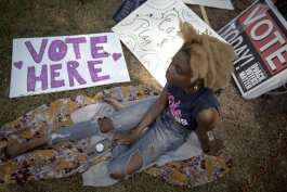 Alandria Ivory, a campaign worker for Memphis for All, takes a break during an early voting event at Glenview Community Center. (Andrea Morales)