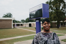 Stephanie Love stands in front at Whitney Elementary in Frayser, which residents say is negatively affected by a nearby landfill.
