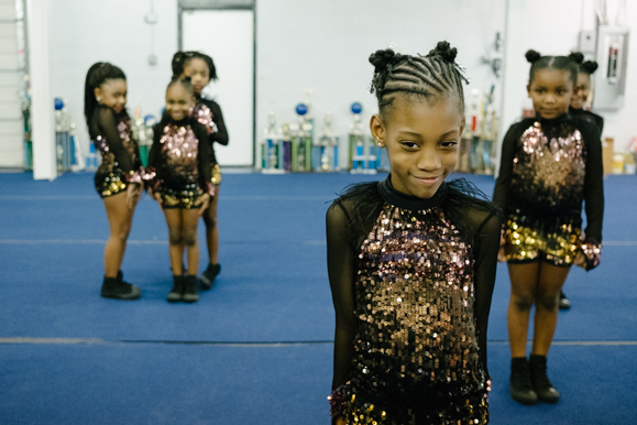 The Memphis Area Youth Association tinys group, the youngest group at ages four through six, pose before beginning one of their dances. (Brandon Dahlberg)