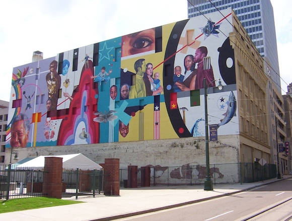 The Note for Hope mural on the side of the Toof Building was created by artist Jeff Zimmerman in 2008