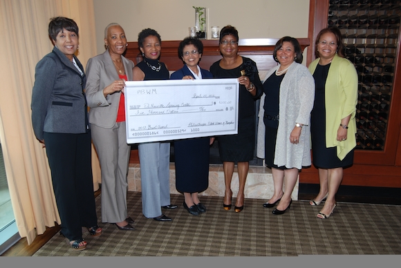 The Philanthropic Black Women of Memphis present a grant award in 2012.