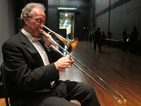 Principal trombonist Greg Luscombe prepares for a performance of Beethoven's Symphony No. 6, “Pastorale," at the Cannon Center