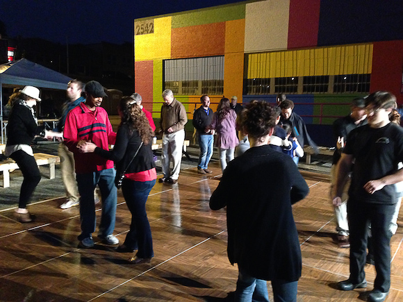 People gather in Binghampton for Dance on Broad, an "active arts" program