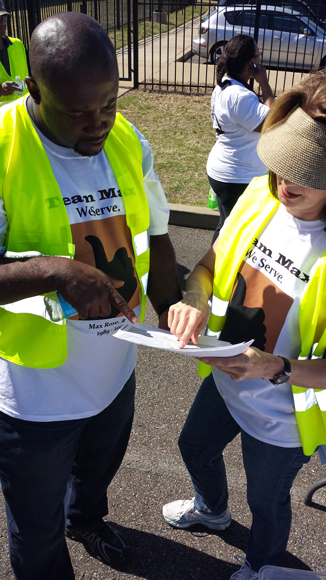 Intervention specialist Delvin Lane helps coordinate a community clean-up