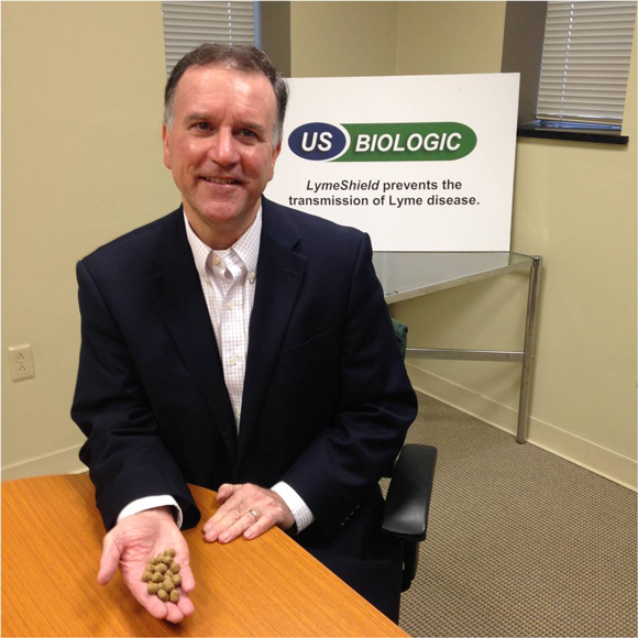 US Biologic President and CEO Mason Kauffman holds LymeShield pellets, a new Lyme Disease prevention vaccine