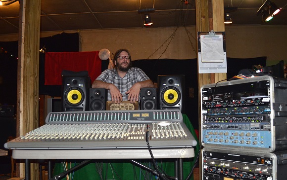 Robin Pack at Rocket Science Audio stands behind the console the studio purchased from the estate sale of Isacc Hayes