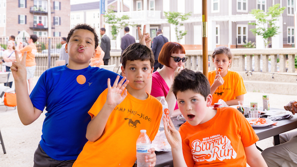 Kids celebrating at the June 2nd Wear Orange Event, which took place at Loflin Yard