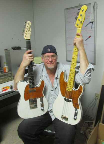 Memphis Guitar Spa owner Kevin Ferner shows off some of his custom work
