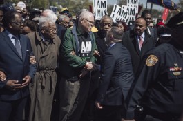 Rev. James Lawson (second from left), AFSCME president Lee Saunders, Al Sharpton and Rev. Martin Luther King III march together. (Andrea Morales/MLK50)