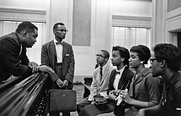 Archie "A.W." Willis, Jr. stands at center. Seated are members of the Memphis State Eight. These students were the first to integrate what is now the University of Memphis.