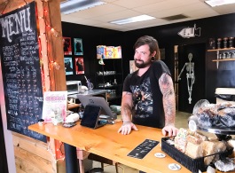 Jimi Myers stands at the counter of Launch Process Coffee at 584 Tillman Street, founded in May 2018. (Cole Bradley)