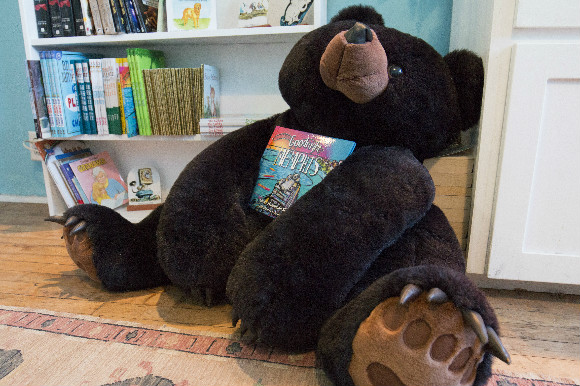 A stuffed bear clutches "Goodnight Memphis", a children's book by local author Grace Hammond Skertich.