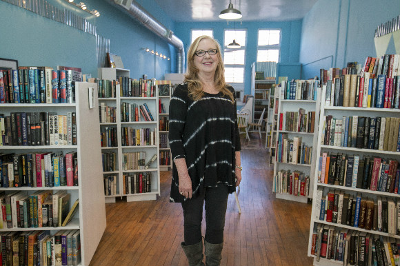 Jean Williams Andrus poses in her three-year-old Downtown bookstore.