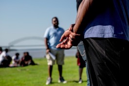Greg Woodberry, a member of the Official Black Lives Matter Memphis, clasps his hands behind his back while performing an adapted rap during the Bridge Shut Down reunion at Tom Lee Park. 