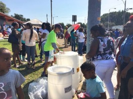 Volunteers facilitate recycling at the 2017 Orange Mound Parade.