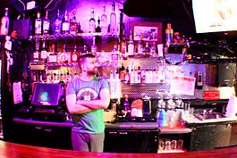 A local bartender stands alone at his station. Many Memphis bars and restaurants are already closing to control the spread of COVID-19. Many more are expected to close with the possibility of a city- or statewide shutdown. (Cole Bradley) 