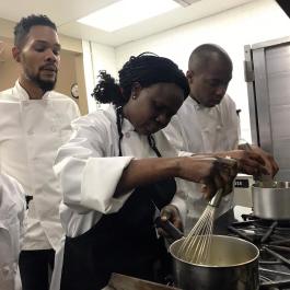 Eli Townsend, executive chef of Sage Memphis, teaches Kaleidoscope Kitchen students. (Submitted)