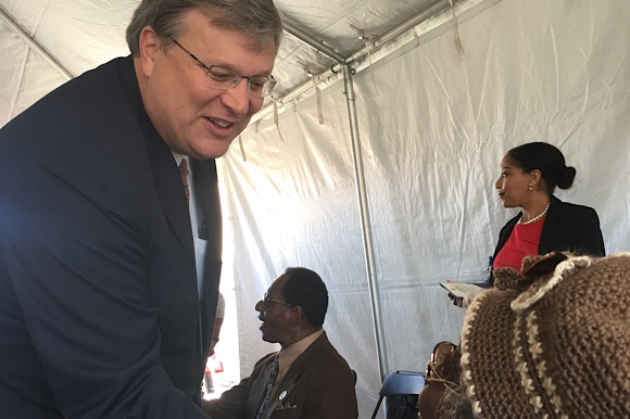 Mayor Jim Strickland greets the crowd at the I AM A MAN Plaza ground breaking ceremony honoring the legacy and leadership of the sanitation workers who marched to make Memphis a fairer and easier place to work during the civil rights movement. 