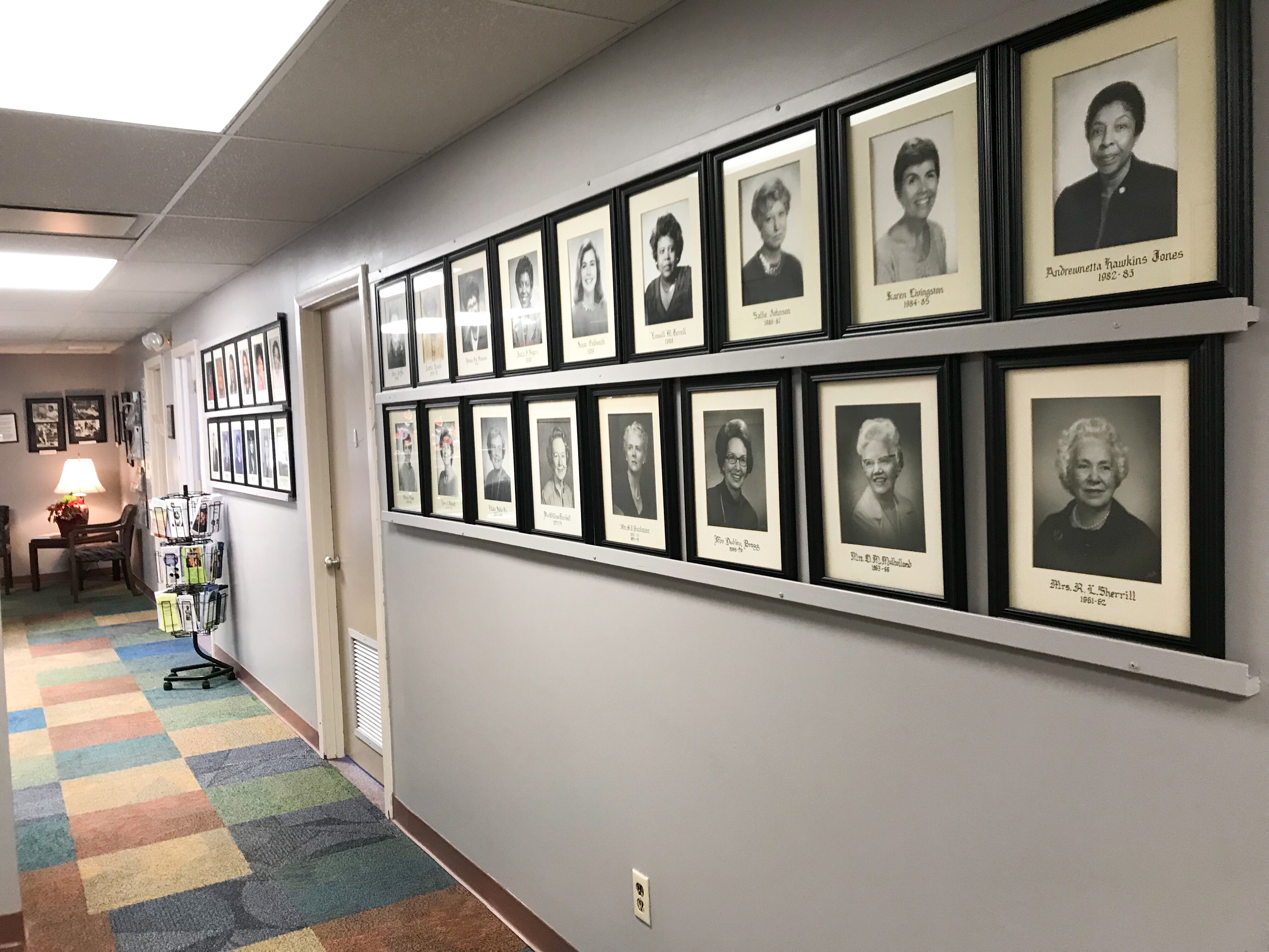 Photos of past board members line the walls of the YWCA of Greater Memphis’ headquarters. The YWCA celebrates its 100th year in Memphis this year. (Cole Bradley)