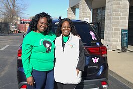 Tiffany Sumlin (left) and her mother, Tricie Cullens, are Meals on Wheels volunteers. The dedication is real: Tiffany got off work at 6 a.m. and came to volunteer after her shift, and her mom had a heart transplant just four months ago.