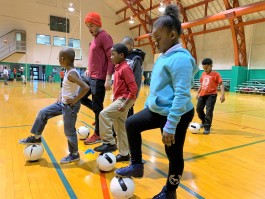 Joel Katz, senior manager, Youth Sports Partnership with the Memphis Grizzlies Foundation, leads a group of Play Where You Stay students in soccer drills at the Gaston Community Center. (Submitted)