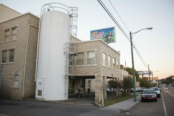 The longstanding Turner Dairy detracts from property values and redevelopment opportunities, some adjacent property owners say.