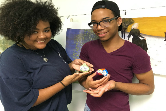 Volunteers painted rocks to promote local nonprofits.