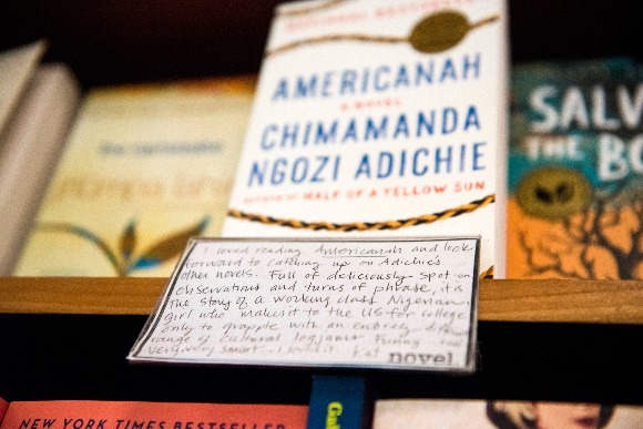 Employees leave handwritten book recommendations on a display of staff picks at Novel bookstore in East Memphis. (Brandon Dill/High Ground News)