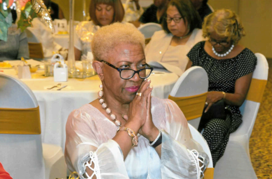 A guest looks on at performers and speakers at the Orange Mound Progressive Club's centennial celebration in September 2019. (Submitted, Tyrone P. Easley)