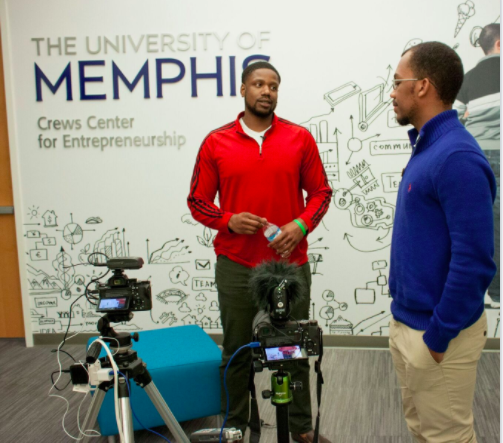 James Brown, a senior at Whitehaven High, interviews Tony Knox with Memphis-based Fitnexx. 