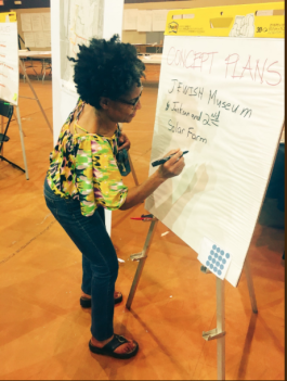 An Uptown resident adds her priorities to a list of possible new developments. (Community Redevelopment Agency)