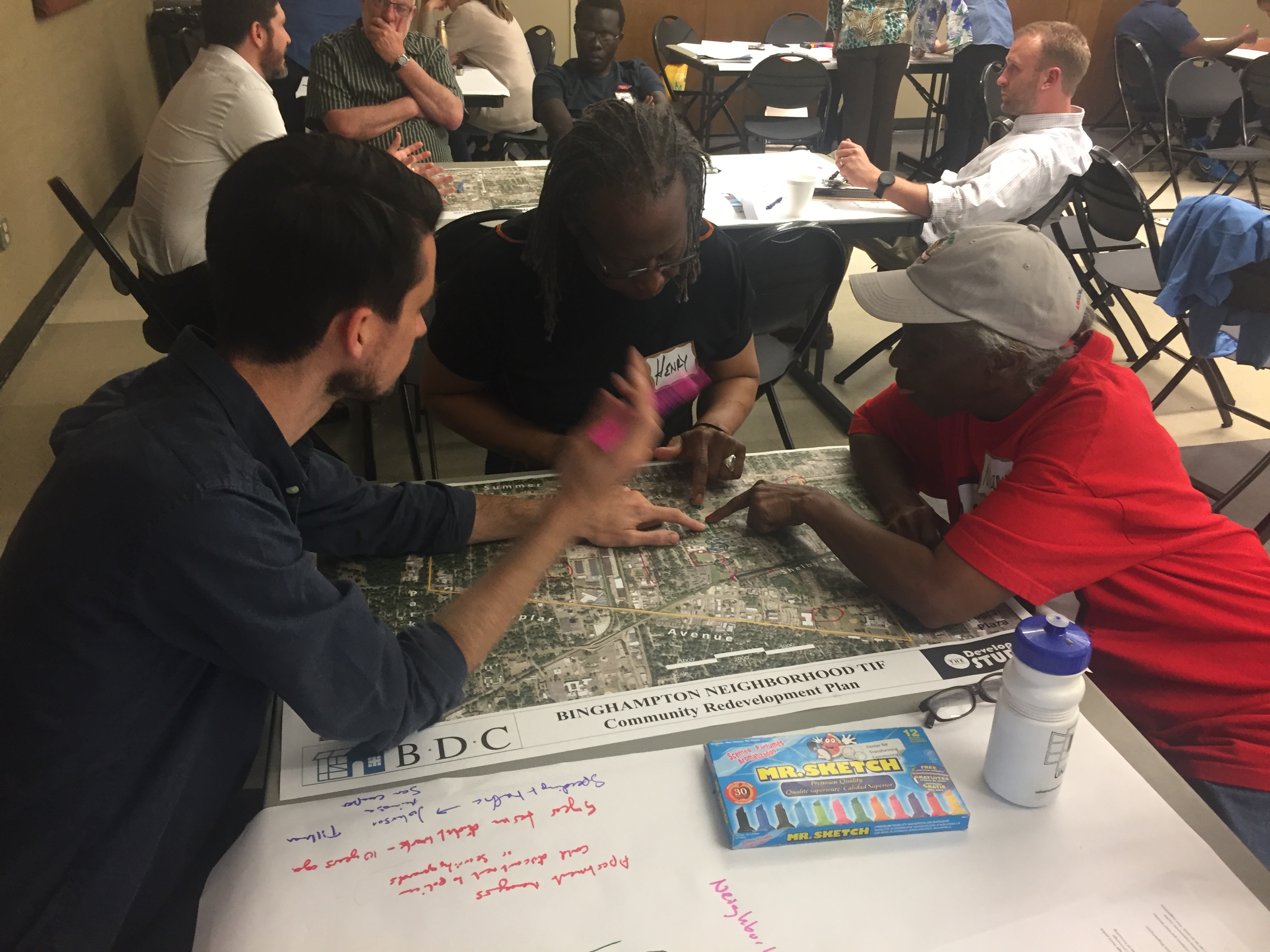 TIF community task force members Kenny Latta, Henry Nelson, and Mary Williams (left to right) at a May meeting working together to understand what they've heard from community members. (Submitted)