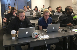 Brad Montgomery, local software developer, teaches the Tech901 Code 1.0 class, where students learn coding languages for front end and back end development. (Kim Coleman)