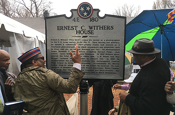 Andrew "Rome" Withers, left, son of Ernest C. Withers, helped unveil a historical marker at the home of the iconic Civil Rights photographer.