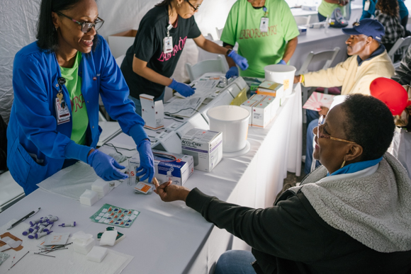 Betty Jones has her blood glucose levels checked at Methodist South's Whitehaven Healthy Community Day. (Brandon Dahlberg)