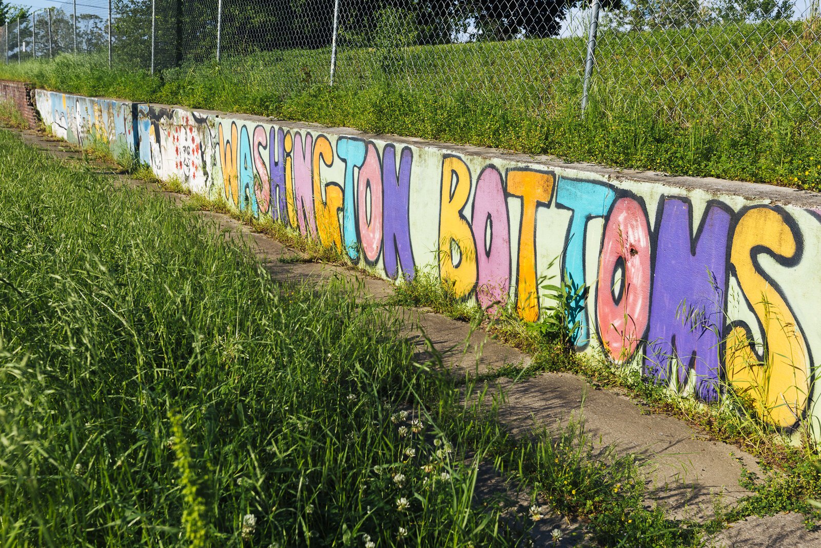 A mural still marks the location of the Washington Bottoms Community Park and Garden at the corner of North Watkins and Court streets. (Ziggy Mack)