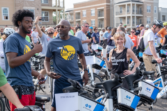 Cyclists interact before the bike ride begins. (Brandon Dahlberg)