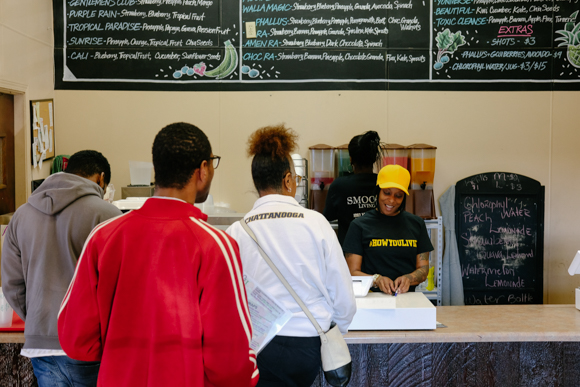 Customers line up for smoothies at Smooth Living in Whitehaven. (Brandon Dahlberg)