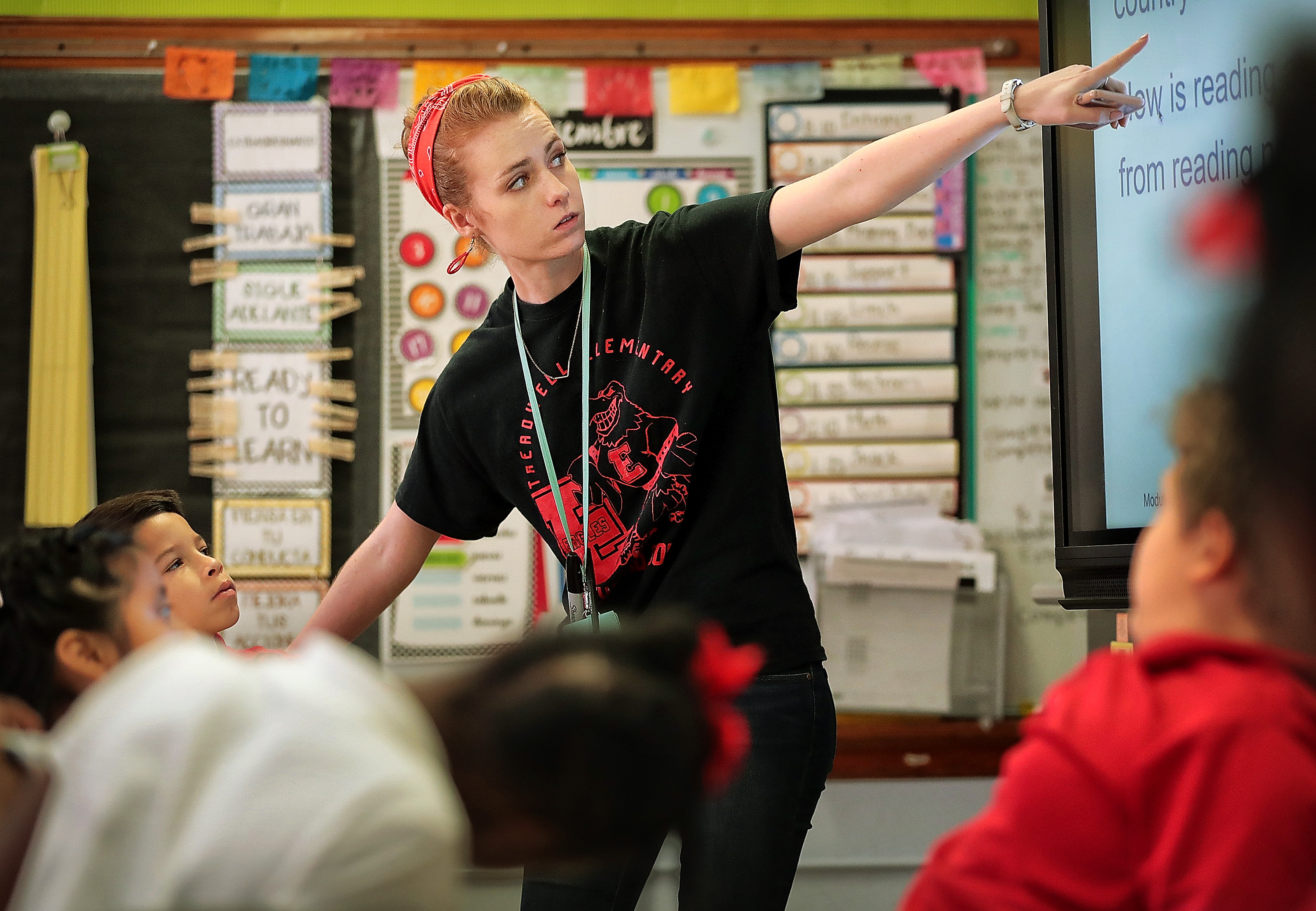 Morgan Schroeder works with third graders in her English class, one of the few classes in Treadwell Elementary School's dual language program where English is spoken. (Jim Weber/Daily Memphian)