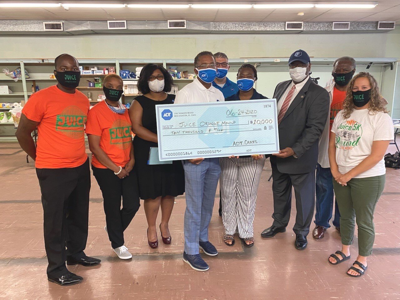 Nonprofit JUICE Orange Mound recently received their largest single donation. ADT Securities donated $10,000 towards its community improvement efforts. (Submitted)