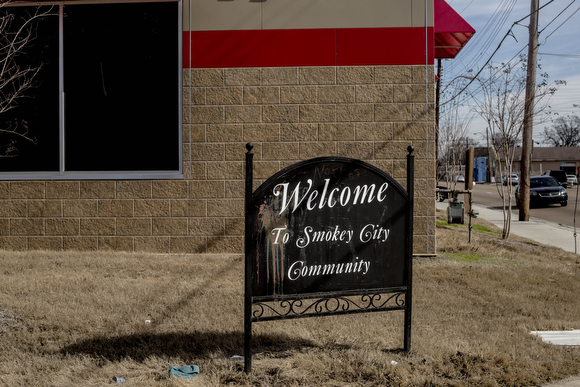 TN: A welcome sign to the Smokey City neighborhood  stands on Jackson Avenue.