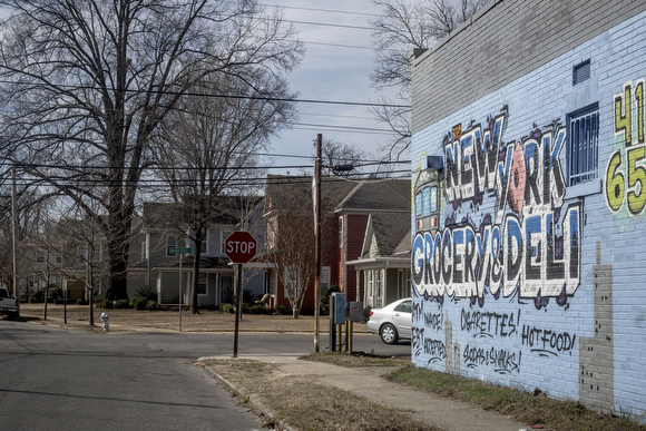 Uptown developments are seen around the corner  from the New York Grocery & Deli on Manassas Street.