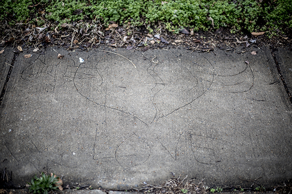  An inscription in the sidewalk on Annie Street in Klondike. 