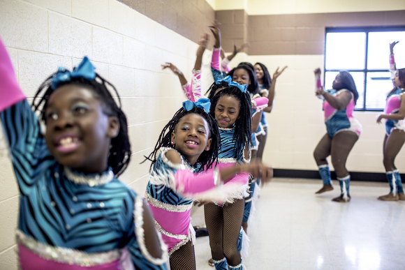 The Diva Sensations dance team lines up for their dress rehearsal at the Dave Wells Community Center before a jamboree. 