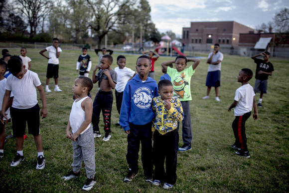  Boys get ready for the first team practice for the North Memphis Steelers at the Katie Sexton Community Center in Klondike.